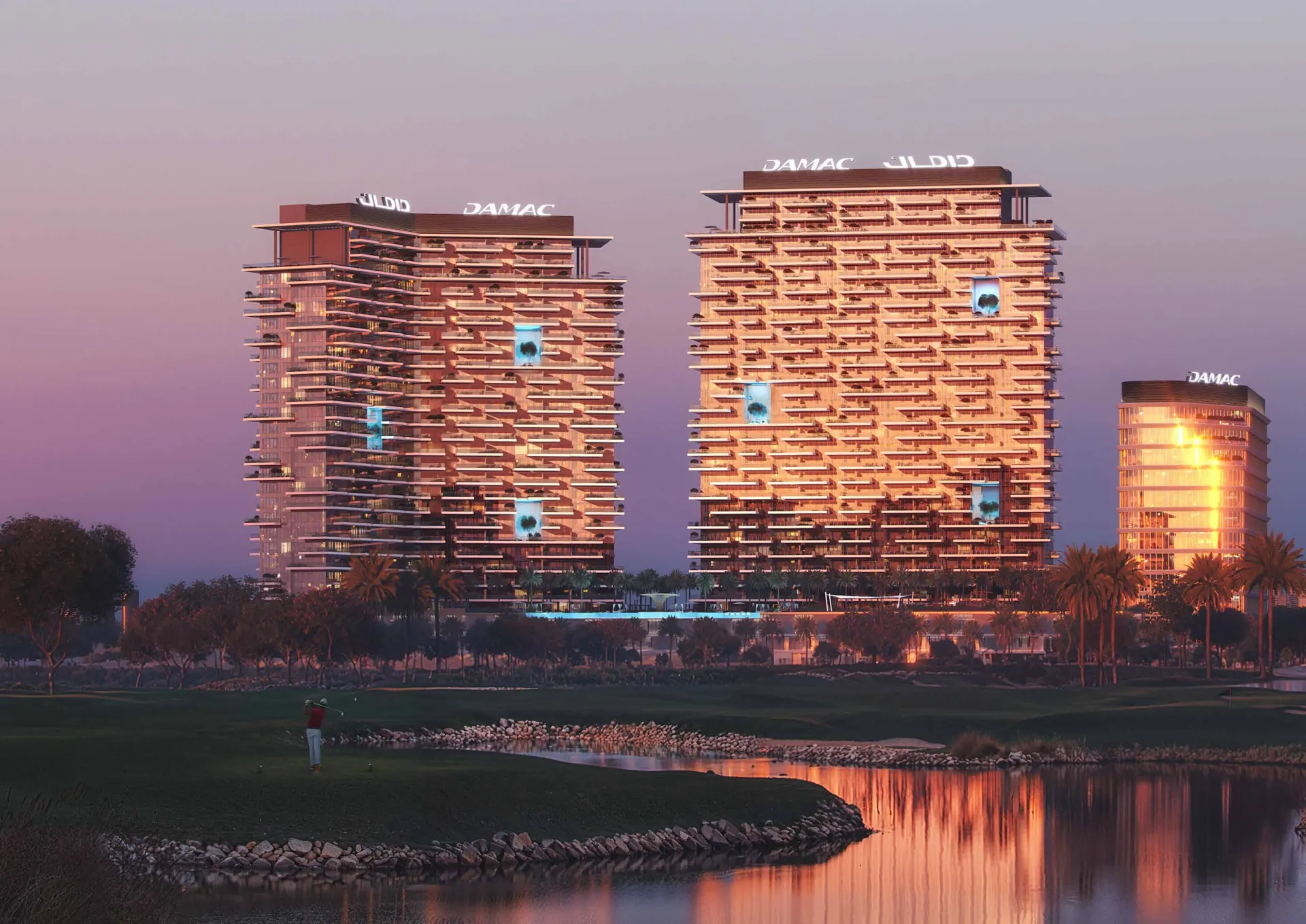 DAMAC District towers at dusk beside the lake and golf course
